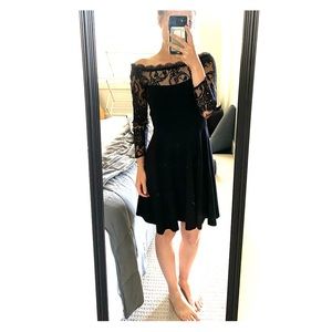 Black dress with lace sleeves and back
